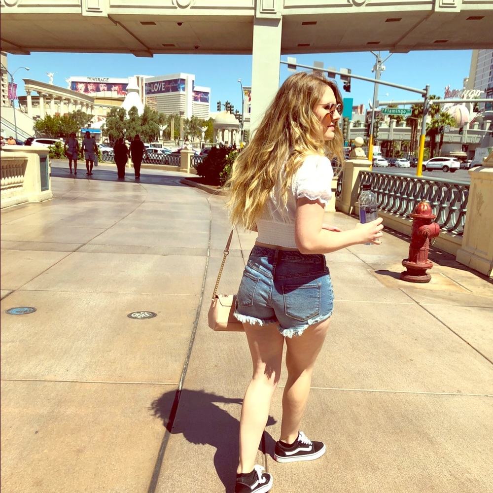high-rise distressed denim shorts
